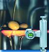 Figure 2. Metering the flow of olive oil: With its low-pressure loss and short overall length, the Promass I proved even better than the customer expected